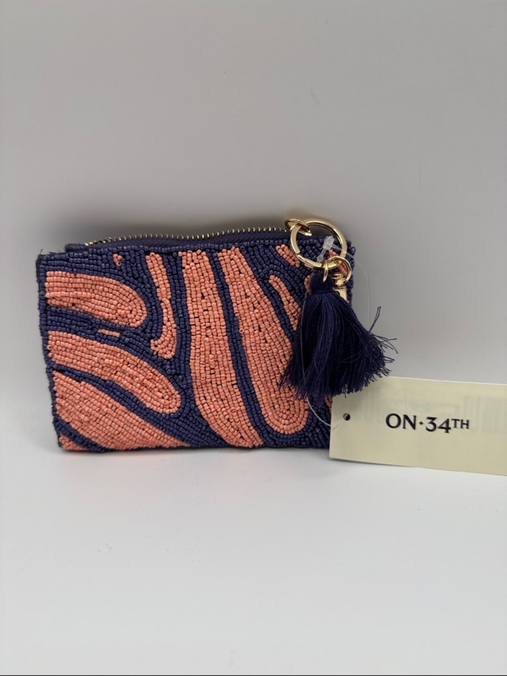 ON·34TH Navy and Peach Beaded Wristlet Pouch with Tassel